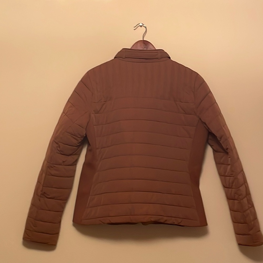 Camel color casual fitted jacket by “New York & Company”.